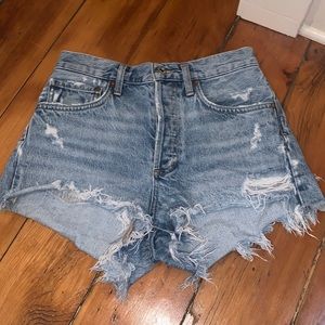 A gold e Jean shorts